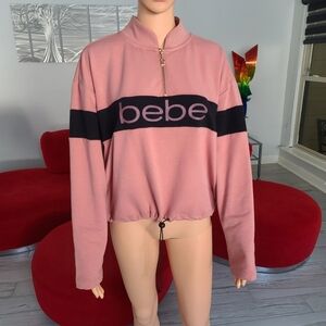 BEBE logo rose gold zip collar pink and black top size L